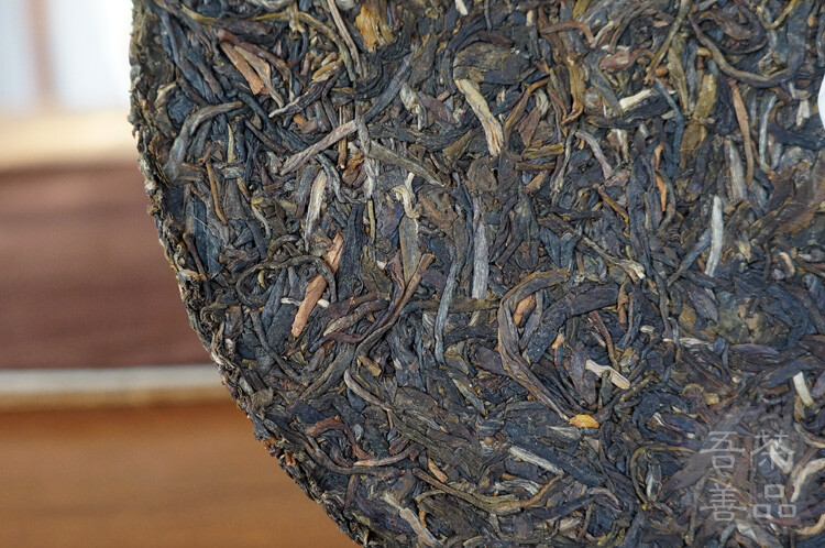 2014 XIAGUAN Brand T8653 Discus Pu-erh Tea Cake Raw Sheng Green Puer Tea 357g
