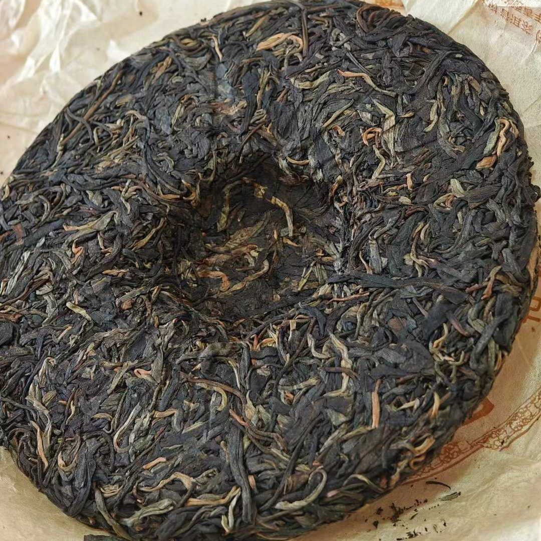 2009 Vintage Yiwu Manzhuan Ancient Tree Raw Puerh Tea Cake, Tongsheng Hao 357g