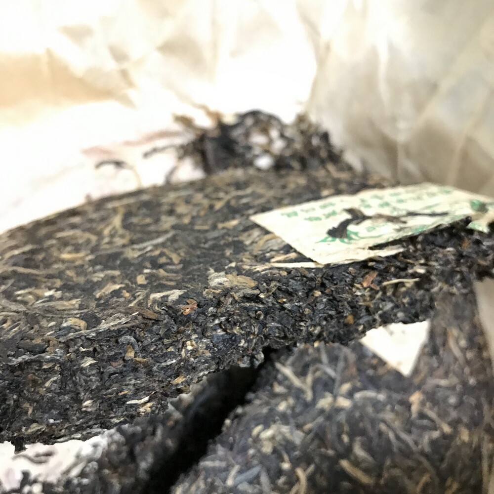 2006 Silver Needle Tributary Puer Meng Hai Qiao Mu Ye Sheng Cha Raw Pu’er 250g