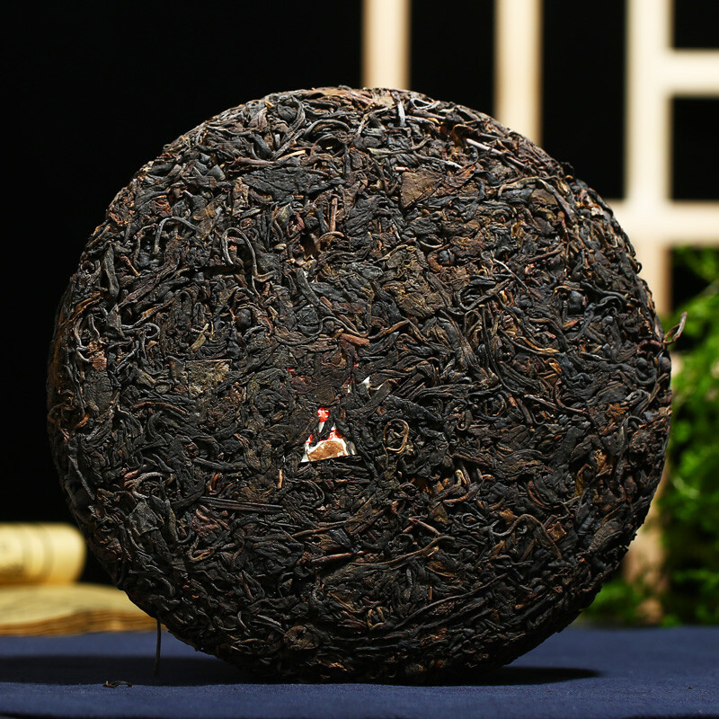 2003 Kong Ming Shan Pressed Qizi Cake of Yiwu Classic Tea Puerh Puer Raw 357g