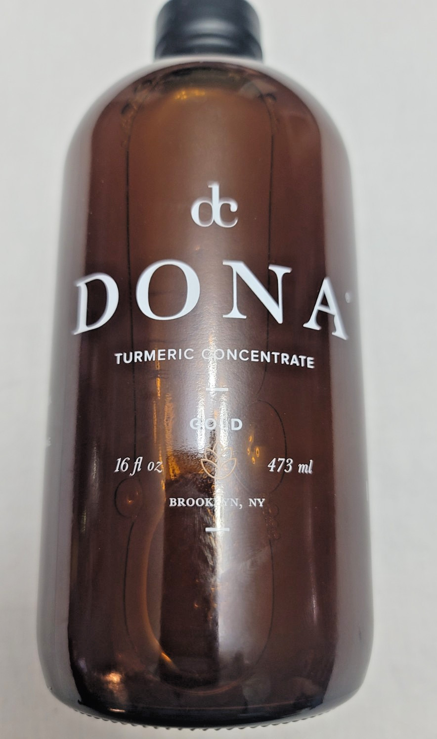 dc DONA TURMERIC CONCENTRATE GOLD 16 FL OZ