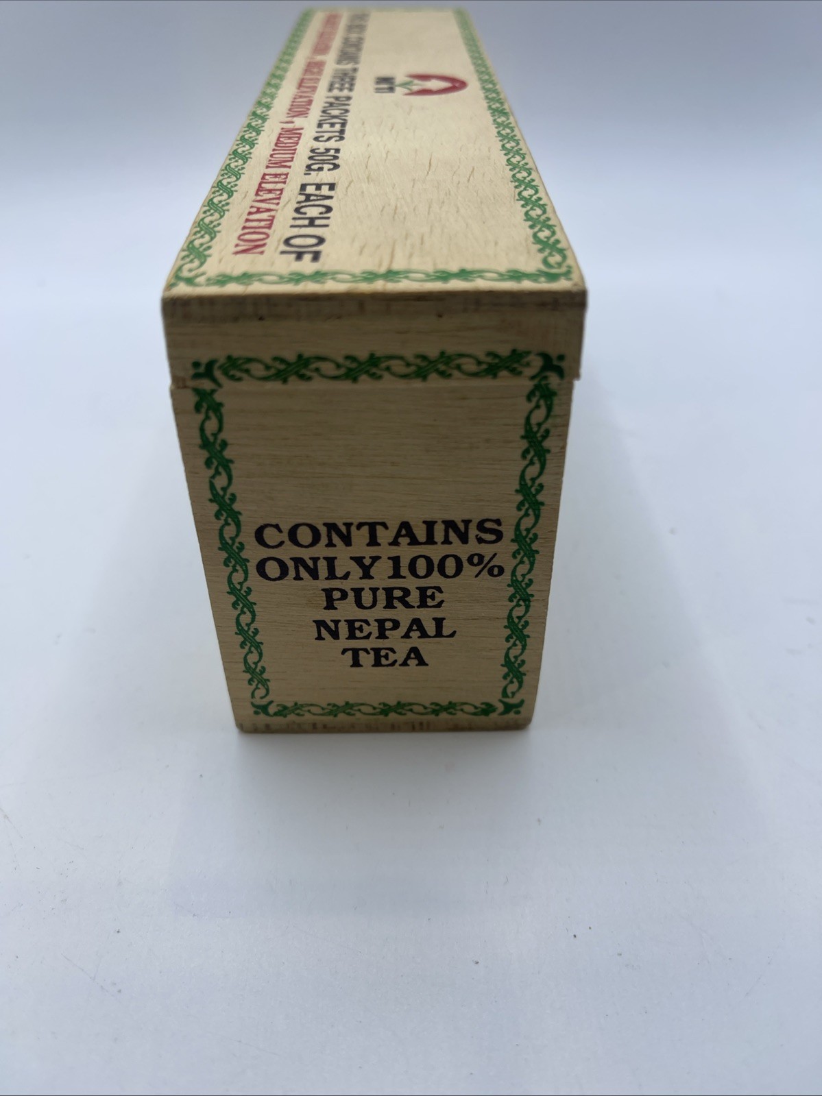 Wooden Tea Box from Niti Labeled “Three Packets 50G” from Different Elevations