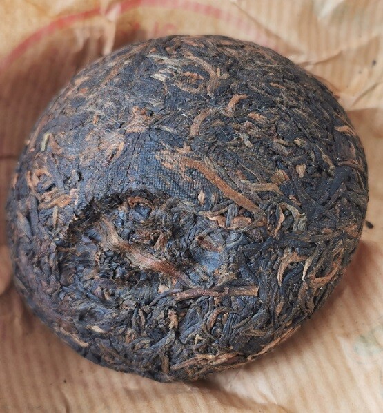 One piece of 2004 Xiaguan 下関 100g green box Sheng Tuocha 生沱茶 (普洱) raw pu’er tea