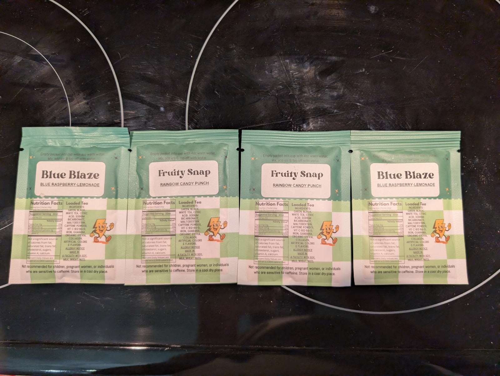 4 packets of “Get Loaded Tea”-Variety of Flavors! Berry,Sour 200mg Caffeine