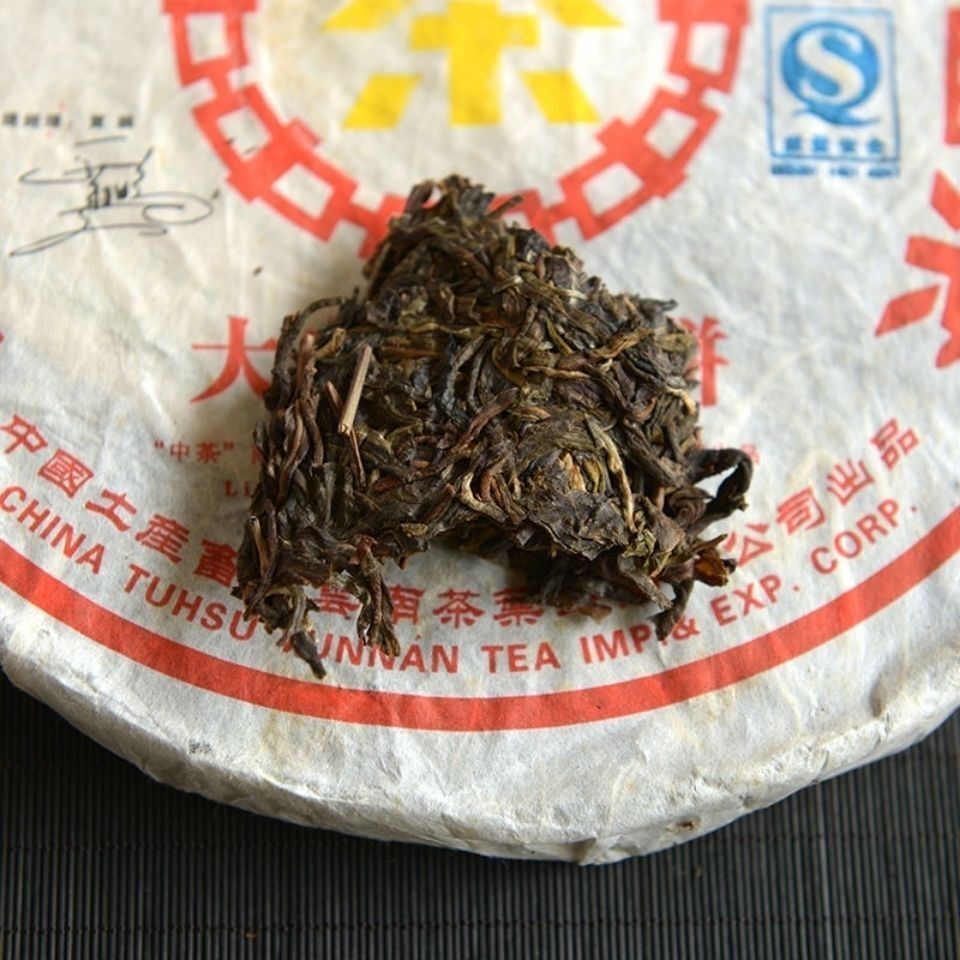 2007 CNNP Kunming Tea Factory 8281 Big Yellow Label Pu’er Iron Cake Tea 380g Raw