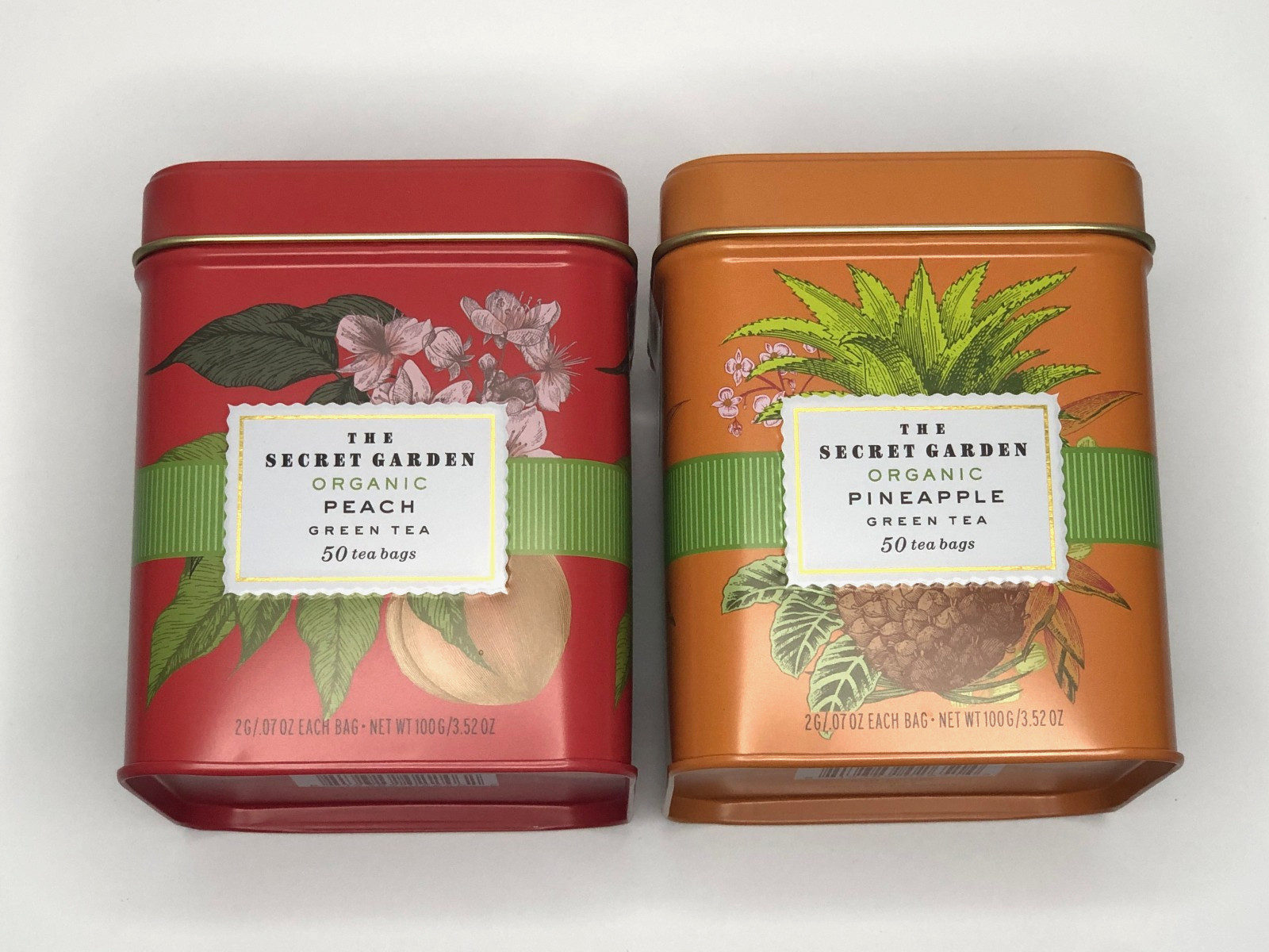 NEW Lot of 2 The Secret Garden 🫖 Organic Peach & Pineapple Green Tea Tins 100ct