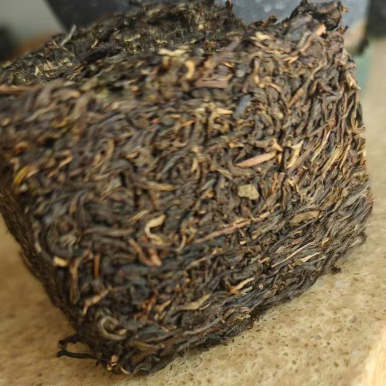 2009 Lao Man’e Sweet Ancient Tree Raw Pu-erh Tea 480g | Aged Sheng Cake