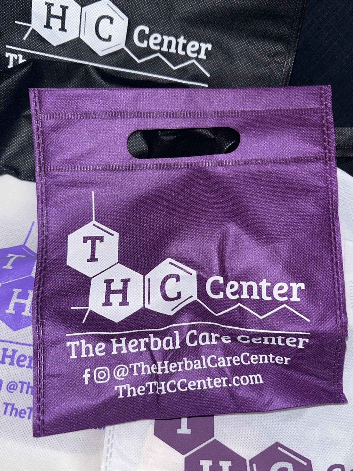 THC Herbal Care Center Purple, Black And White Bags Assortment