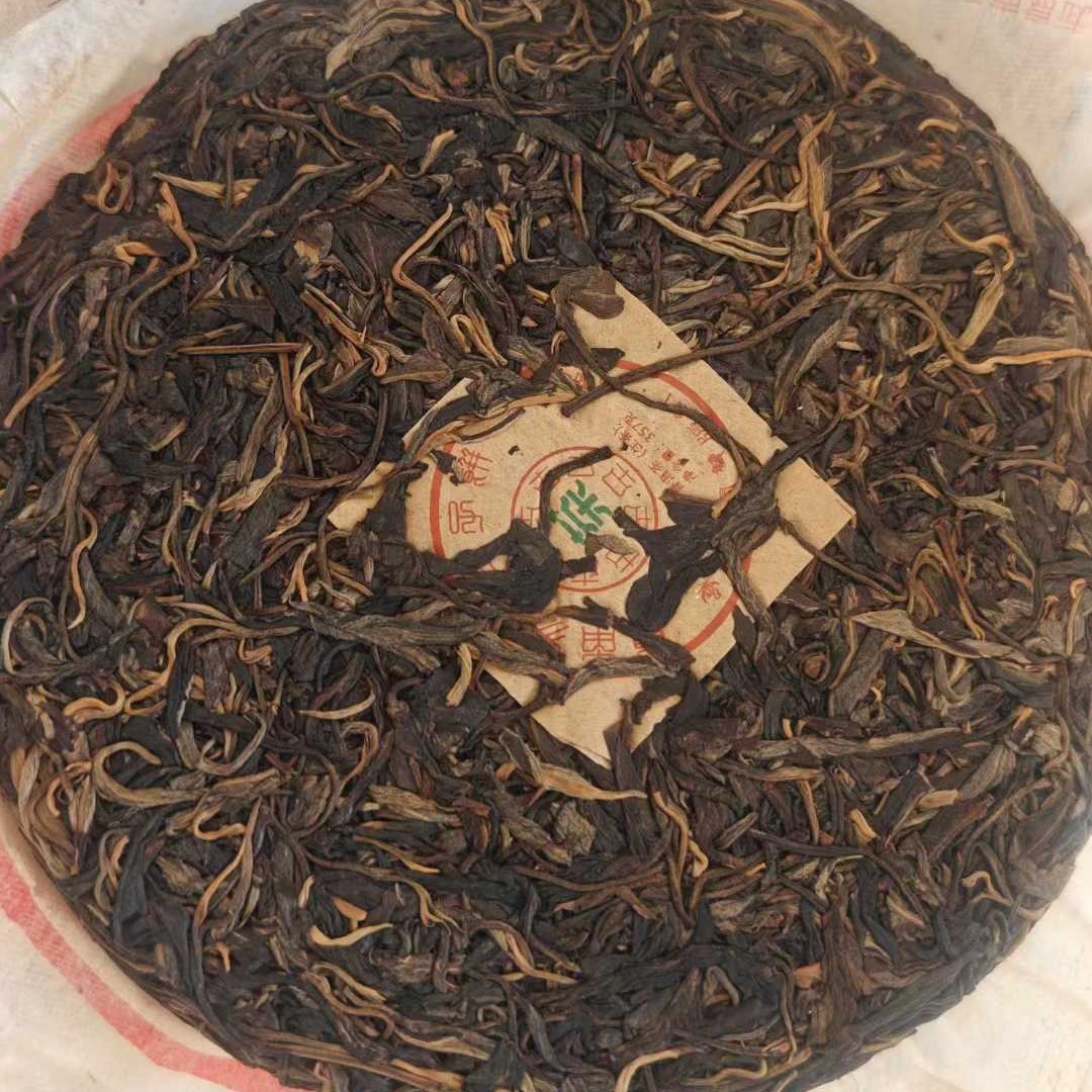 2003 Vintage Material Yiwu Ancient Tree Raw Pu-erh Tea Cake 357g – 2012Y
