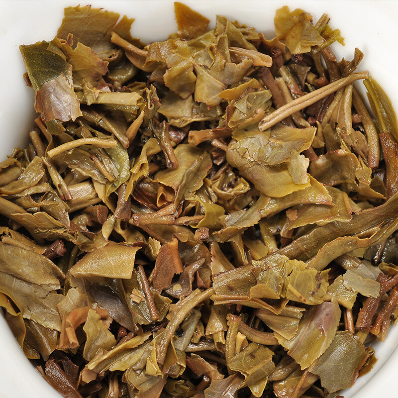 2016 Xiaguan Qian Jia Zhai Wild Aged Old Tree Round Cake Puer Raw Pu’er Tea 357g