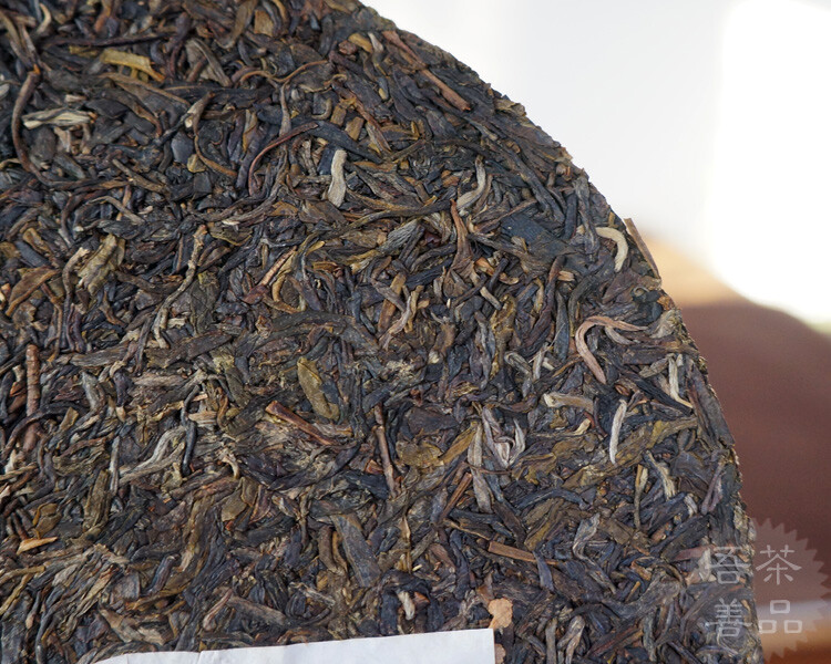2014 XIAGUAN Brand T8653 Discus Pu-erh Tea Cake Raw Sheng Green Puer Tea 357g