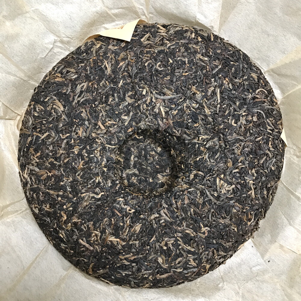 2006 Silver Needle Tributary Puer Meng Hai Qiao Mu Ye Sheng Cha Raw Pu’er 250g