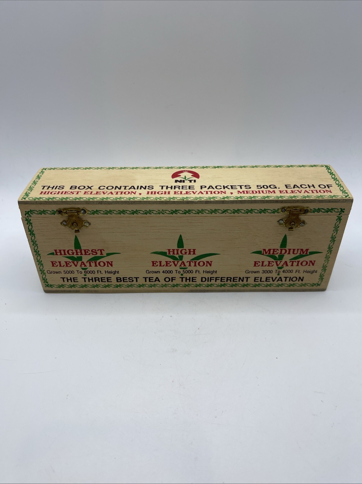 Wooden Tea Box from Niti Labeled “Three Packets 50G” from Different Elevations