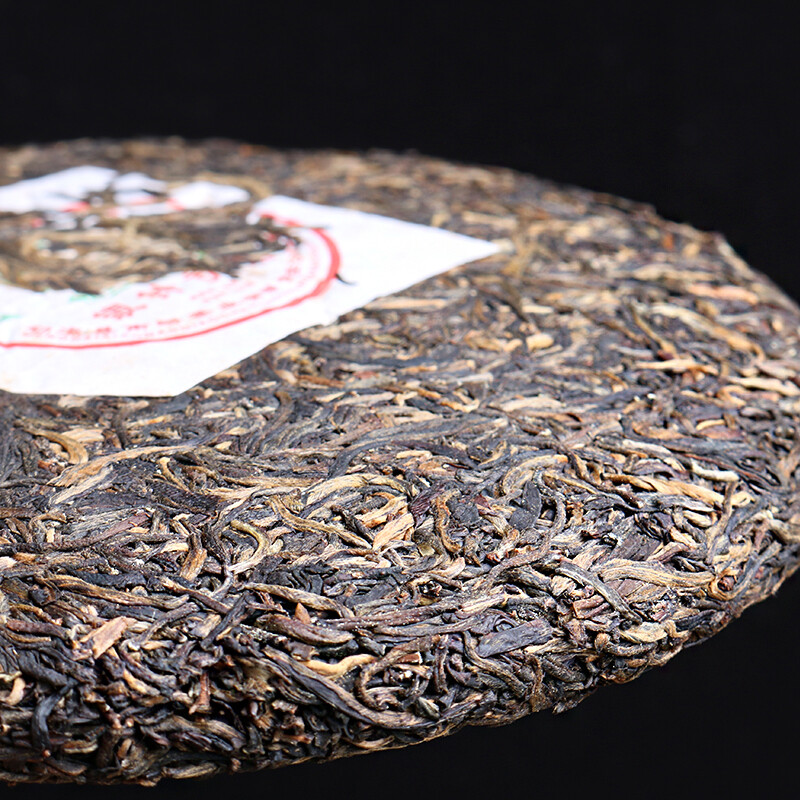 Yin Zhen Gong Bing 2007 Nanqiao Menghai Qiao Mu Sheng Tai Cha Puer Raw Tea 250g