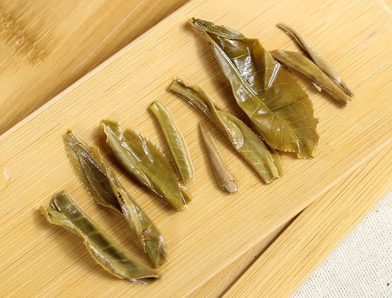 2014 Haiwan High Mountain Ancient Tree Old Comrade 141 Pu-erh Raw Puer Tea 500g