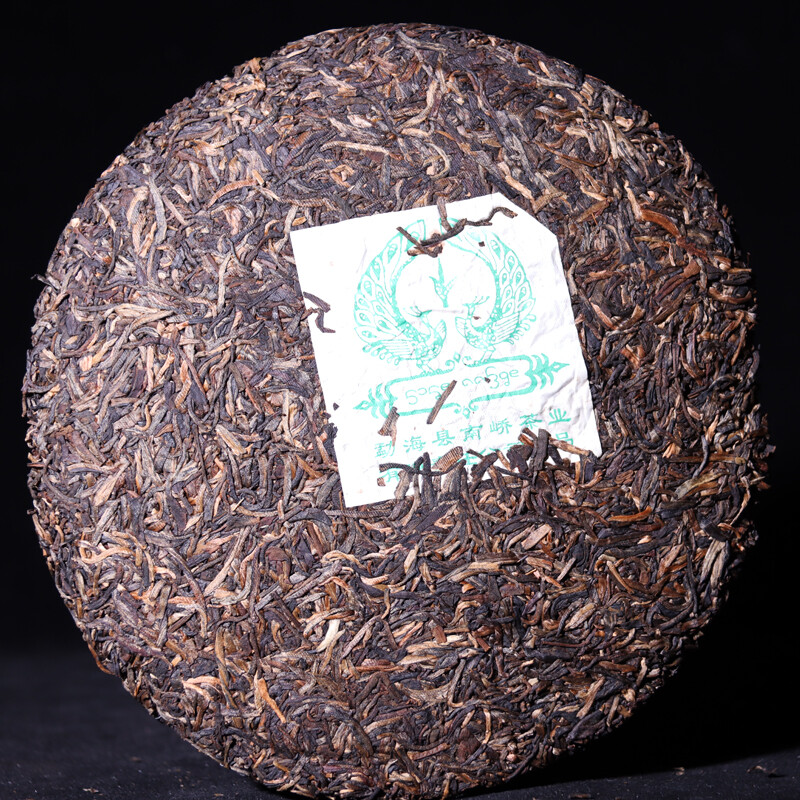 2006 Silver Needle Tributary Puer Meng Hai Qiao Mu Ye Sheng Cha Raw Pu’er 250g