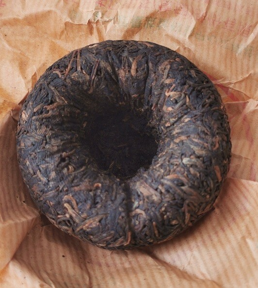 One piece of 2004 Xiaguan 下関 100g green box Sheng Tuocha 生沱茶 (普洱) raw pu’er tea