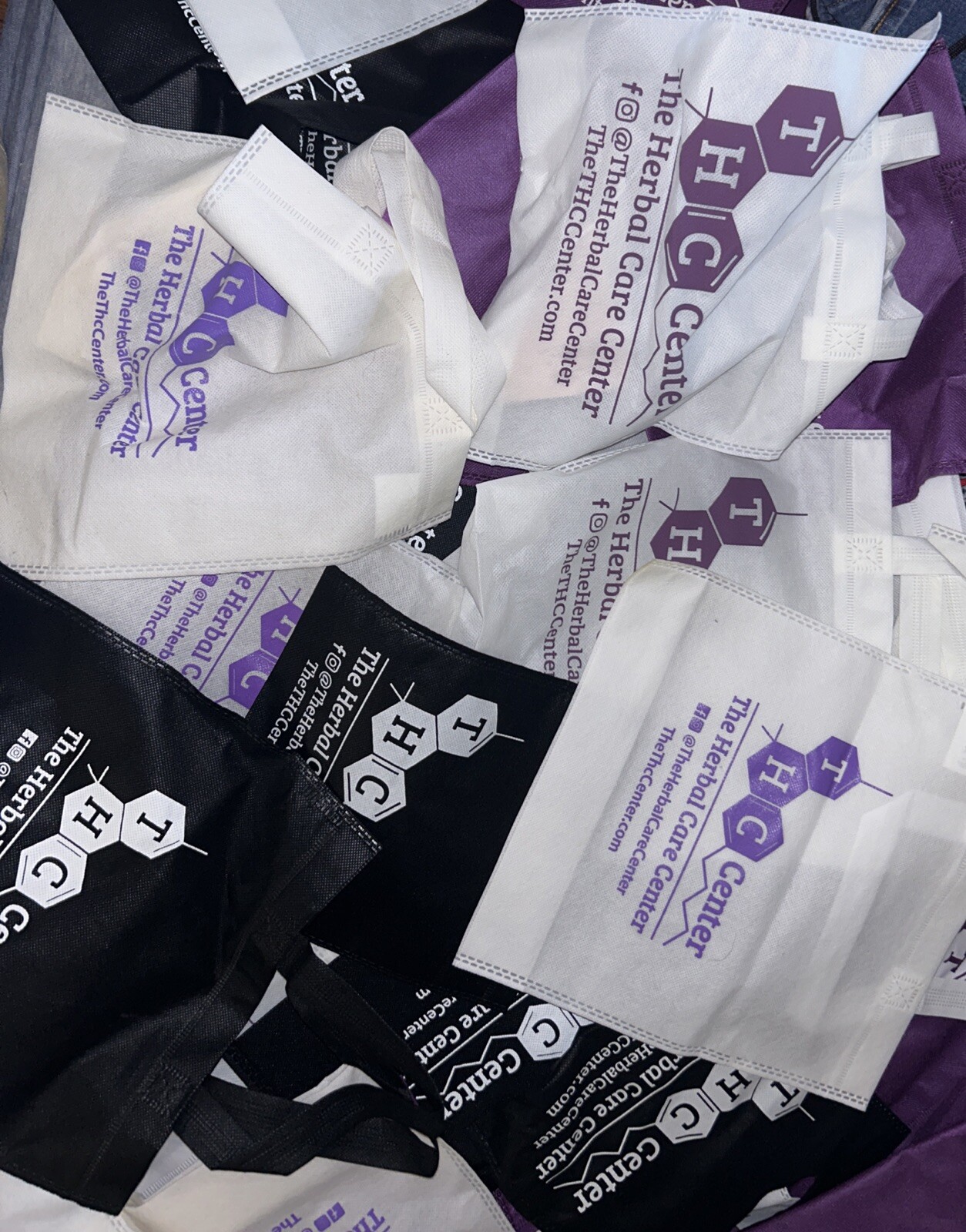 THC Herbal Care Center Purple, Black And White Bags Assortment